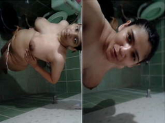 Attractive Desi bitch is in the shower and she plays with her big natural XXX