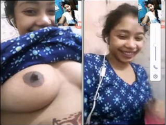 Desi woman with a nice smile and big boobs is showing off her XXX on camera
