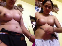 Curvy woman with phenomenal XXX boobs stripping down like a good Desi whore