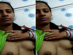 Sexy Desi cutie with round areolas and perky nipples lifts her shirt up XXX