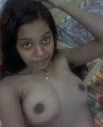 Pressing her natural Desi boobs and taking selfie photos in XXX style as well