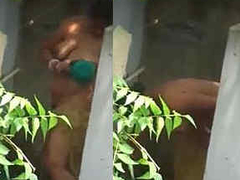 Superb voyeur video where a chubby Desi woman is bathing thinking about XXX