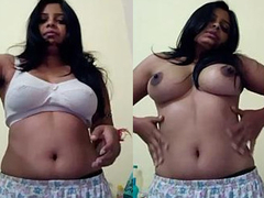 Amateur Desi with huge boobs is pressing her XXX boobs and we have the tape